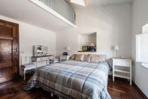 Lucca sui tetti客房内的一张或多张床位