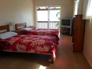 瓦伊亚库拉度假屋客房内的一张或多张床位