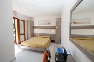 Hotel Da Italo客房内的一张或多张床位
