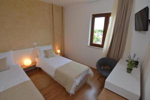 Hotel Natura Vilanija客房内的一张或多张床位
