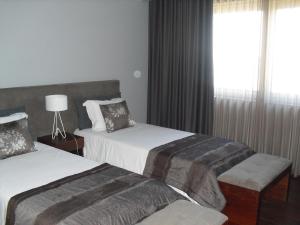 卡米尼亚姆拉哈酒店客房内的一张或多张床位