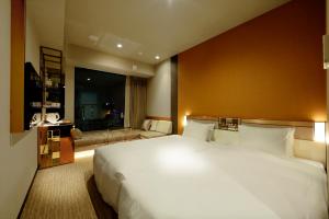 东京六本木公寓酒店客房内的一张或多张床位