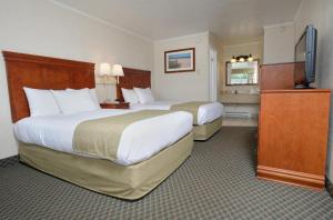 海立方汽车旅馆 - 里霍博斯海滩客房内的一张或多张床位