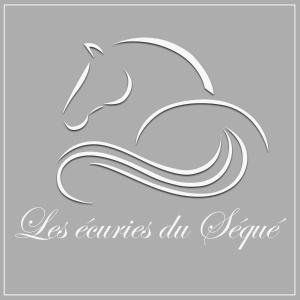 Saint-Martin-de-Seignanx莱斯埃库瑞杜塞克住宿加早餐旅馆的带有所有业力的词的马徽