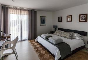 厄加勒斯角海洋酒店客房内的一张或多张床位