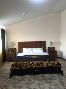 Hotel Agat客房内的一张或多张床位