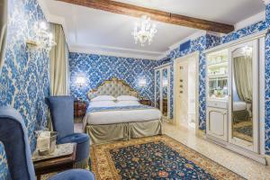 卡瓦列里威尼斯酒店客房内的一张或多张床位
