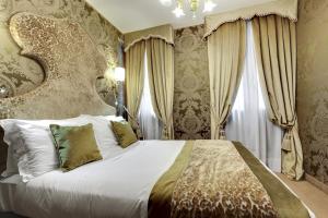 卡萨诺瓦酒店客房内的一张或多张床位
