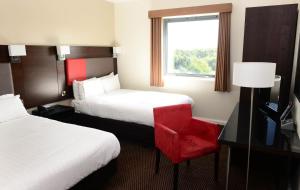 特尔福特国际酒店客房内的一张或多张床位
