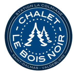 瓦尔代布洛尔Chalet Le Bois Noir的带有 ⁇ 头的徽章