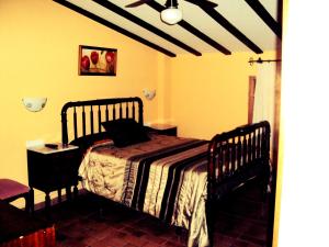 拉蒂娜亚旅游酒店客房内的一张或多张床位