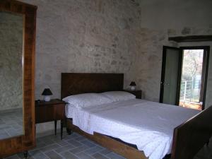 Masseria del Ponte客房内的一张或多张床位