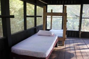 Reserva Natural Tucuchira客房内的一张或多张床位