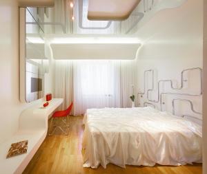 欧若拉酒店客房内的一张或多张床位