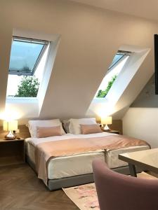 Design & Wine Vila Special Bled客房内的一张或多张床位