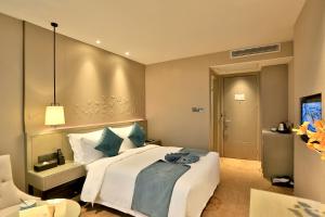 义乌半岛星际酒店客房内的一张或多张床位