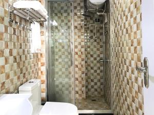 广州行客公寓区庄地铁店的一间浴室