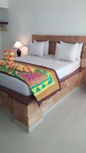 艾湄海洋度假村客房内的一张或多张床位