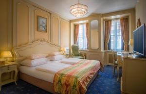 罗马大帝城堡酒店客房内的一张或多张床位