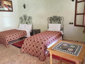 Hotel Wissam客房内的一张或多张床位