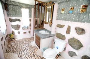 博透海滩微笑简易别墅酒店的一间浴室