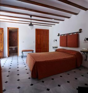 Hotel Casa de los Arcos客房内的一张或多张床位