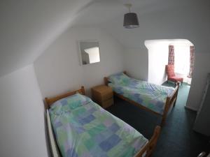 Portstewart Holiday Home客房内的一张或多张床位