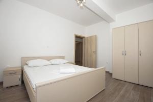Apartmani Vrtlici Zdenka客房内的一张或多张床位