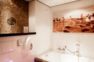 特克塞尔果岭酒店的一间浴室