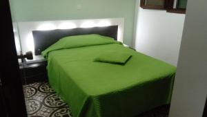 Casa de Campo Ecológica en Sierra de Monesterio Siquem客房内的一张或多张床位