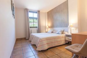 Hostal Pagozelai客房内的一张或多张床位