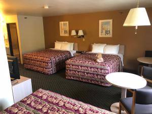 科迪国王酒店客房内的一张或多张床位