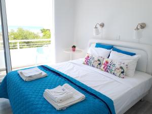 Cozy beach house客房内的一张或多张床位