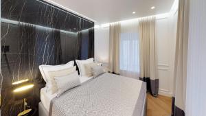 Illyria Luxury Studio Apartments客房内的一张或多张床位