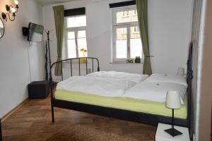 Haus Wallstraße客房内的一张或多张床位
