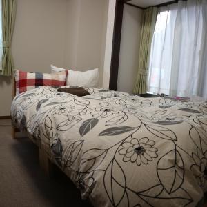 富士山哈娜旅馆客房内的一张或多张床位