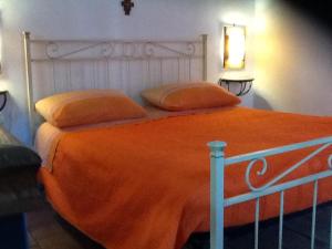 Rifugio di campagna客房内的一张或多张床位
