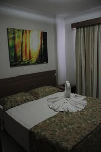 里约热内卢公寓式酒店客房内的一张或多张床位