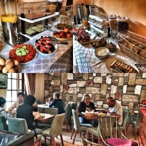 卢特拉艾季普苏卡思奇酒店的一群人坐在餐桌旁吃着食物