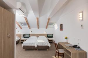 Hotel Vimbula - Komolac客房内的一张或多张床位