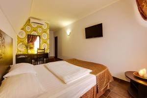 维拉洛萨酒店客房内的一张或多张床位