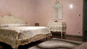 Villa Berra - Via Postale 63/A客房内的一张或多张床位