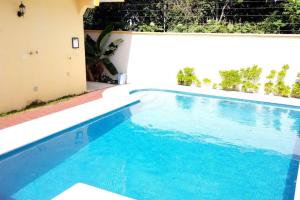 Casa Coral Cozumel内部或周边的泳池
