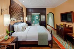 Little Riverside Hoi An . A Luxury Hotel & Spa客房内的一张或多张床位