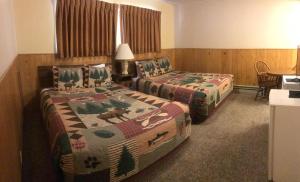 Boulder Lodge客房内的一张或多张床位