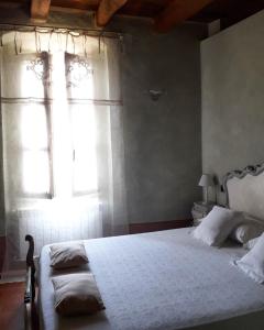 Piccola Corte Antica客房内的一张或多张床位