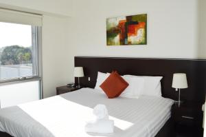 圣基尔达阿达拉公寓式酒店客房内的一张或多张床位