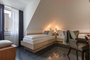 欧罗巴酒店客房内的一张或多张床位