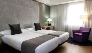 泽尼特奥尔加斯伯爵酒店客房内的一张或多张床位