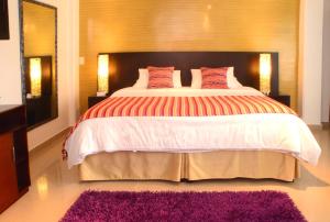 Hotel Tangara Pereira客房内的一张或多张床位